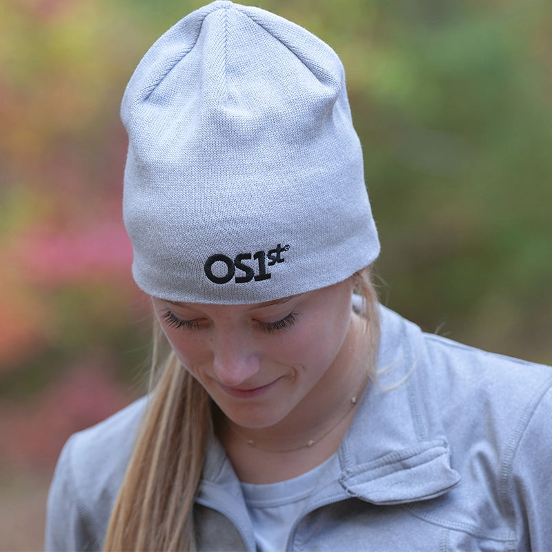 Woman wearing grey OS1st beanie | OS1st