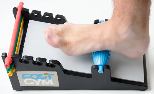 person using the foot gym